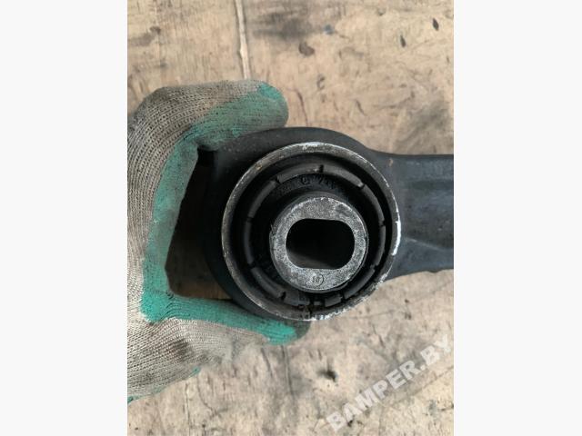 Рычаг передний левый