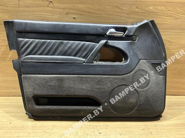 Обшивка двери передней левой (дверная карта)