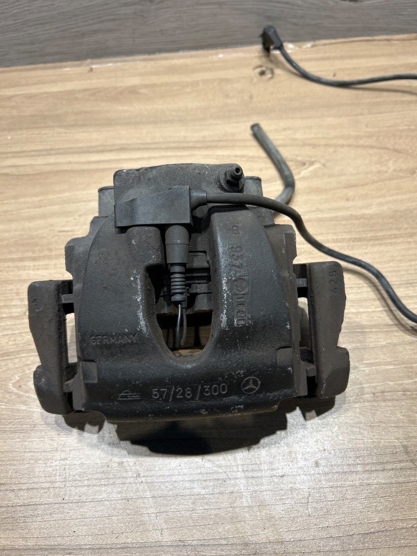 Суппорт передний левый